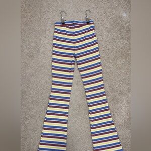 Zara high waisted flare pants stretch material yet snug at the same time.